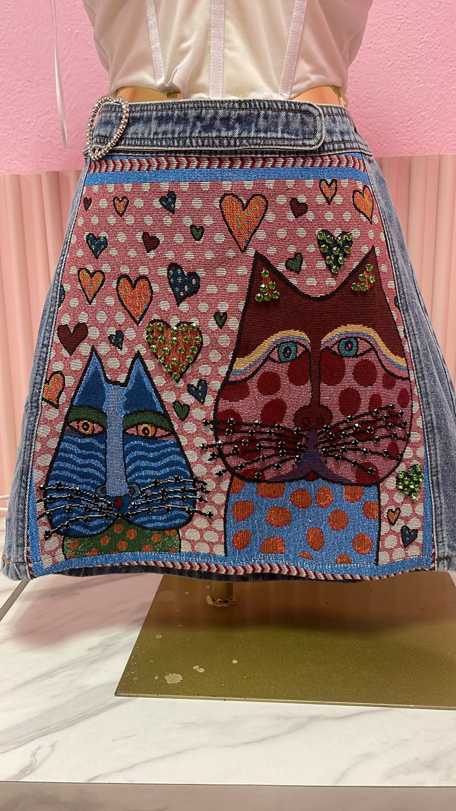 FALDA MEZCLILLA CON BROQUELES