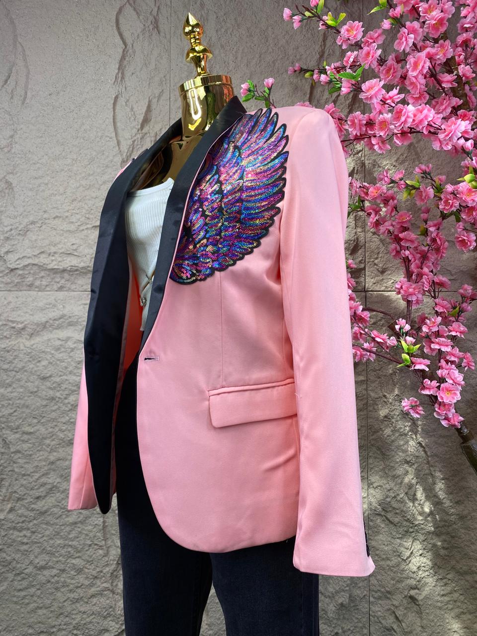 SACO CON ALAS LENTEJUELA ROSA