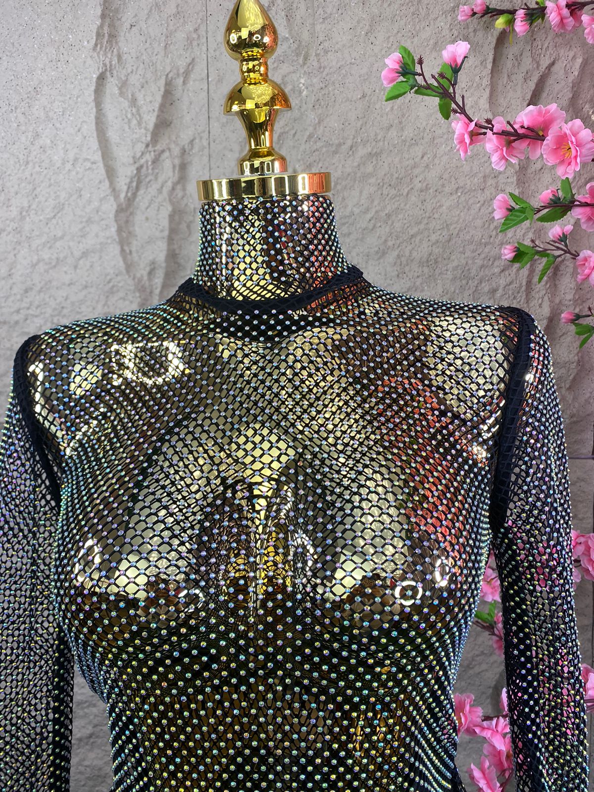 BLUSA ML DE RED CON PLUMAS EN PUÑO