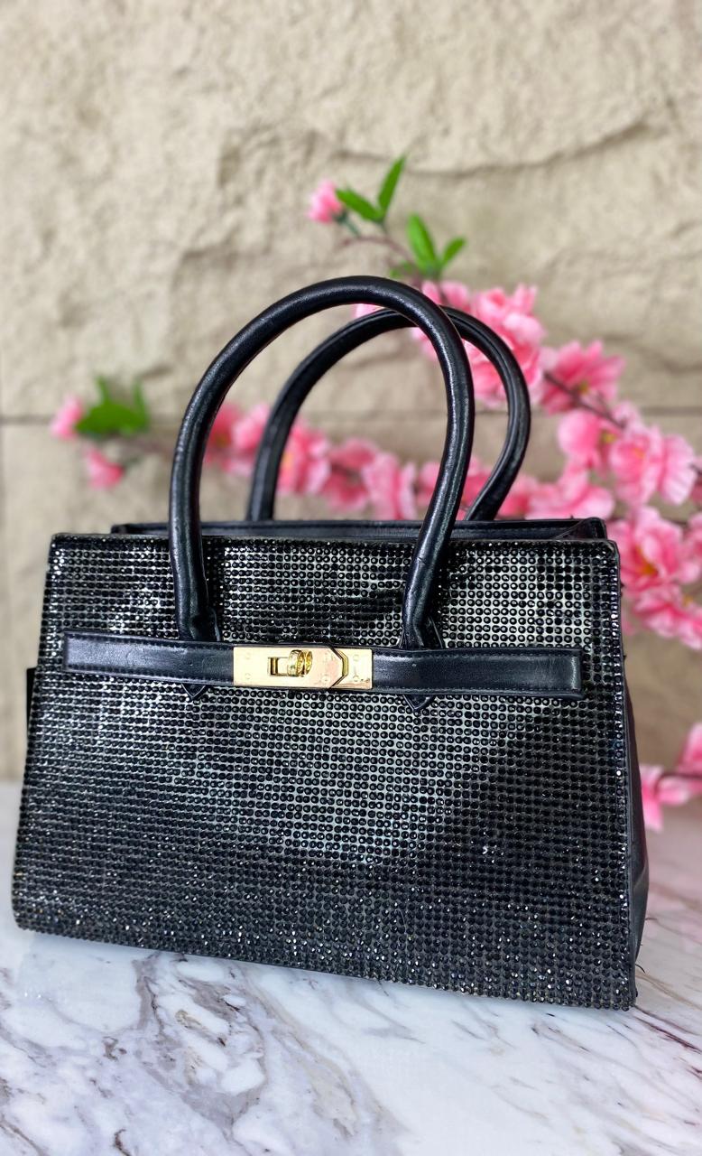 BOLSA MEDIANA CON ASAS Y CORREA NEGRA