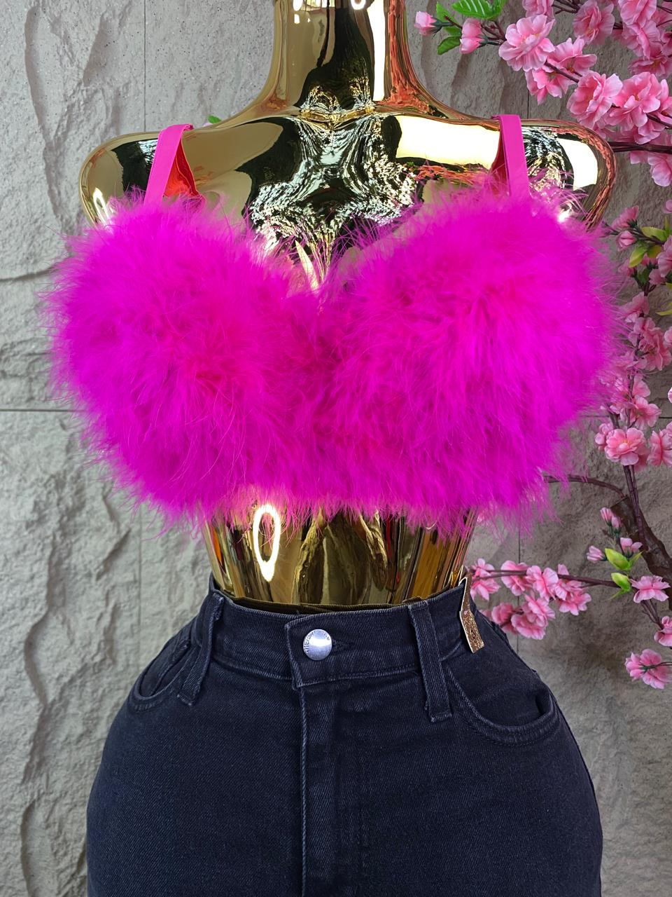TOP PLUMAS FIUSHA