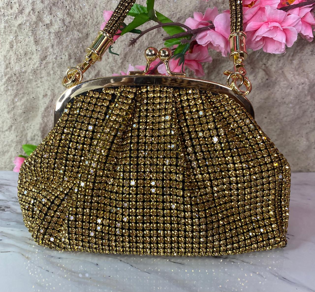 BOLSO DE MANO FRUNCIDO CON DIAMANTES