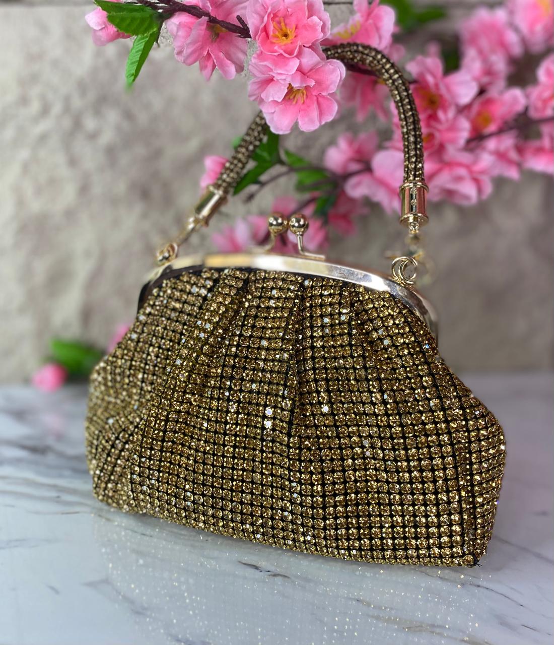 BOLSO DE MANO FRUNCIDO CON DIAMANTES