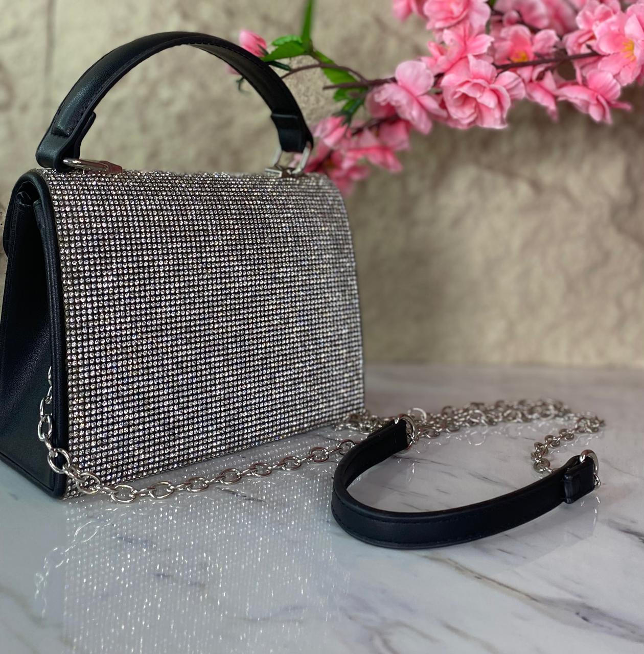 BOLSO DE MANO CON BRILLOS PLATEADOS