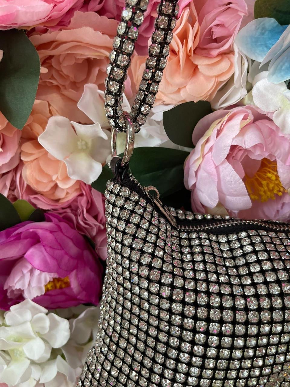 BOLSO DE MANO CON NUDOS Y DIAMANTES