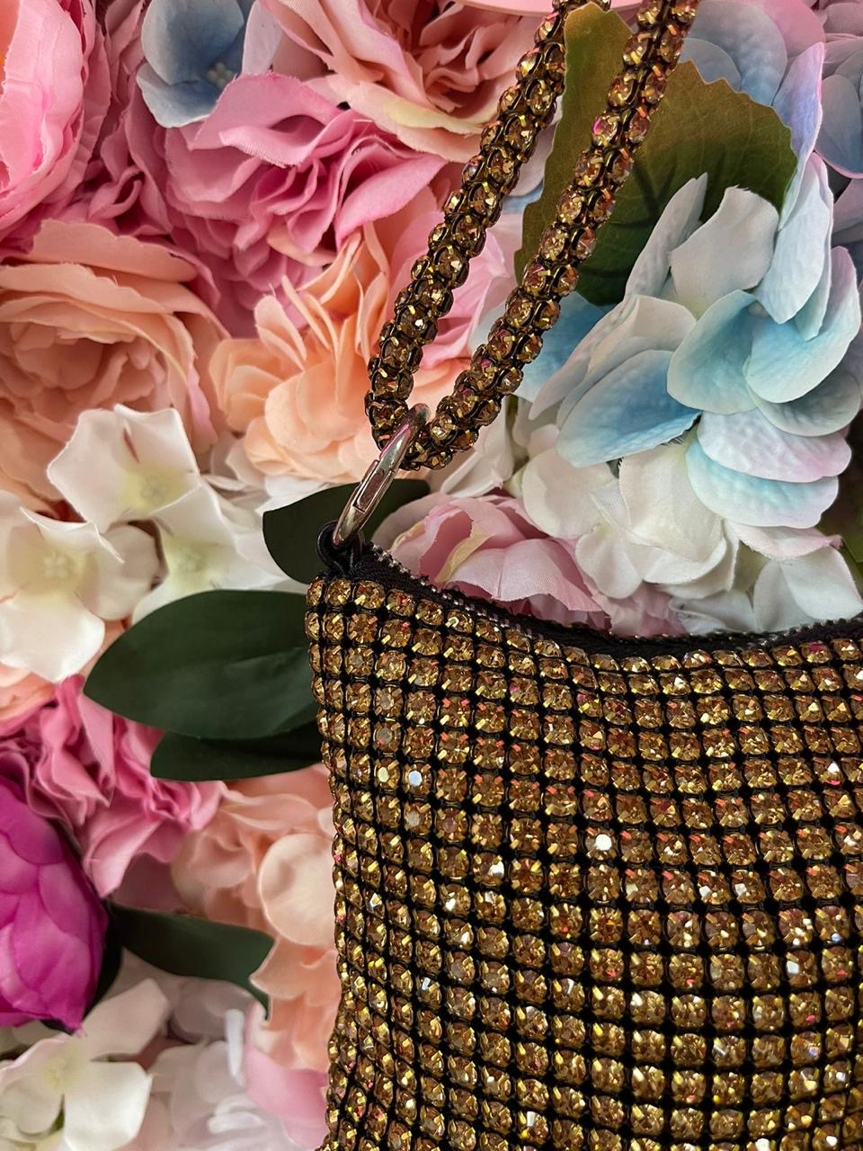 BOLSO DE MANO CON NUDOS Y DIAMANTES