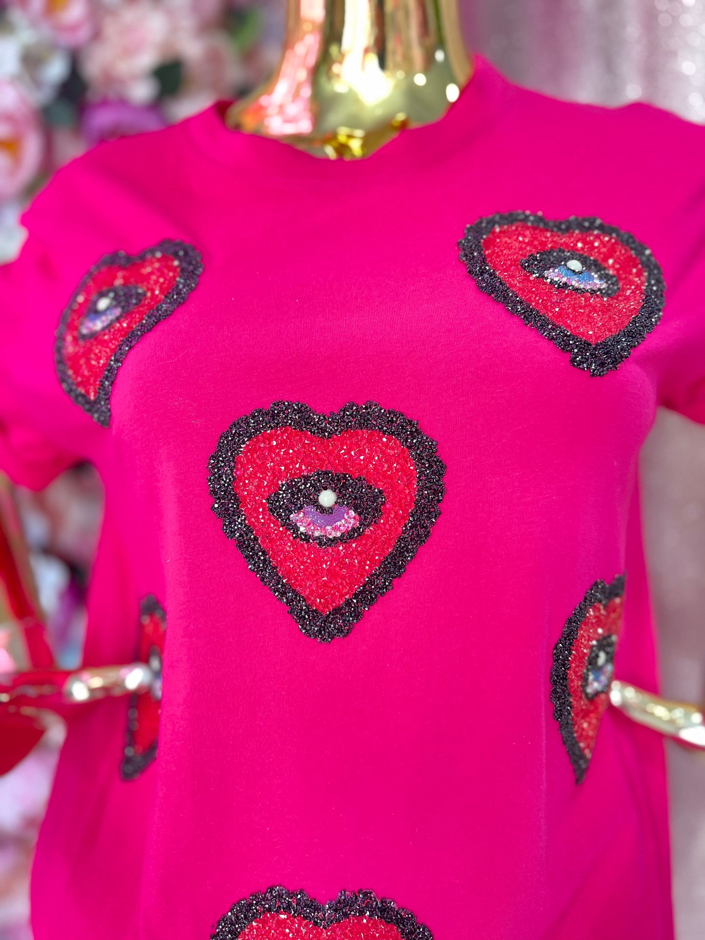 BLUSA CORAZONES OJOS