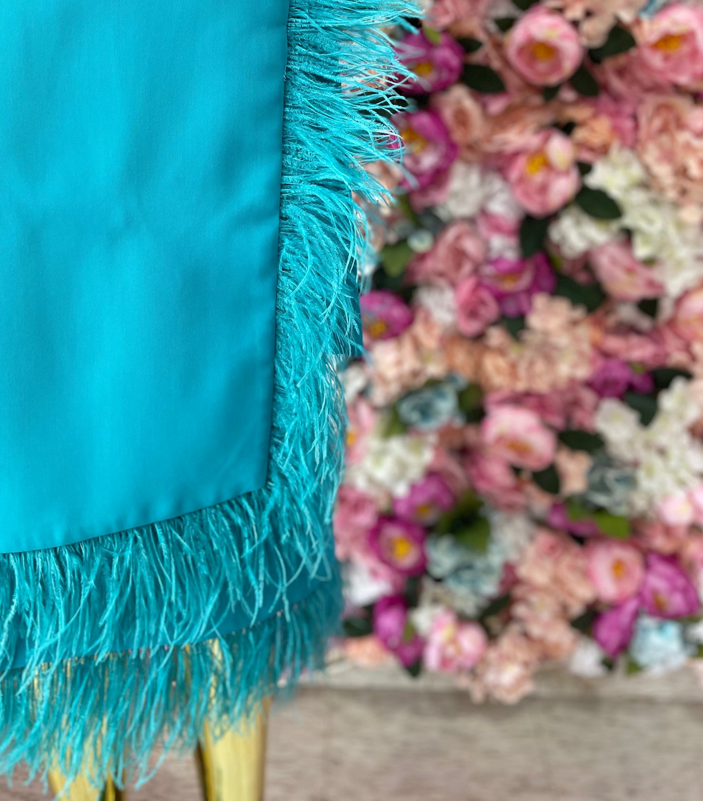 FALDA CON PLUMAS AZUL