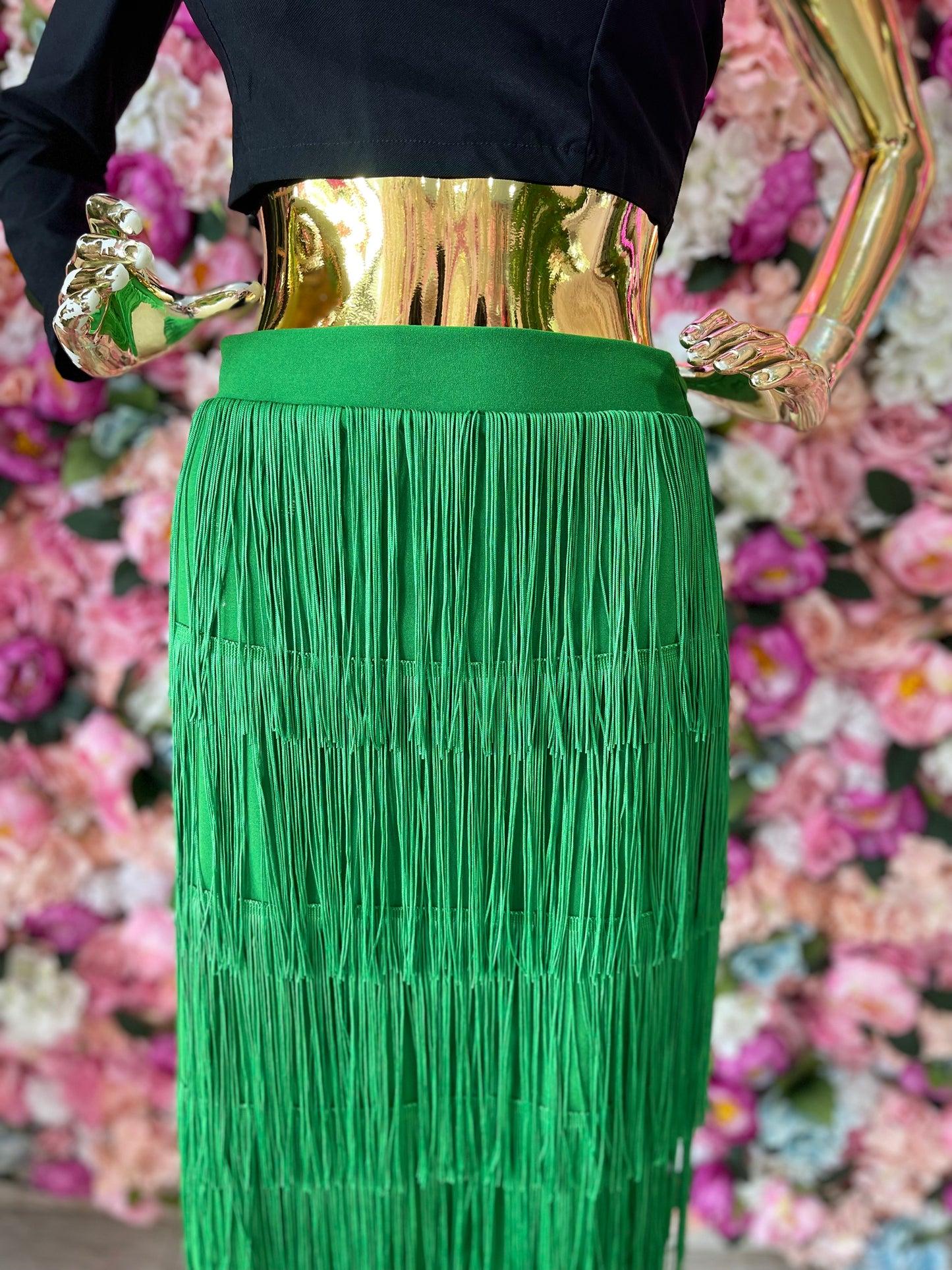 FALDA CON FLECOS VERDE