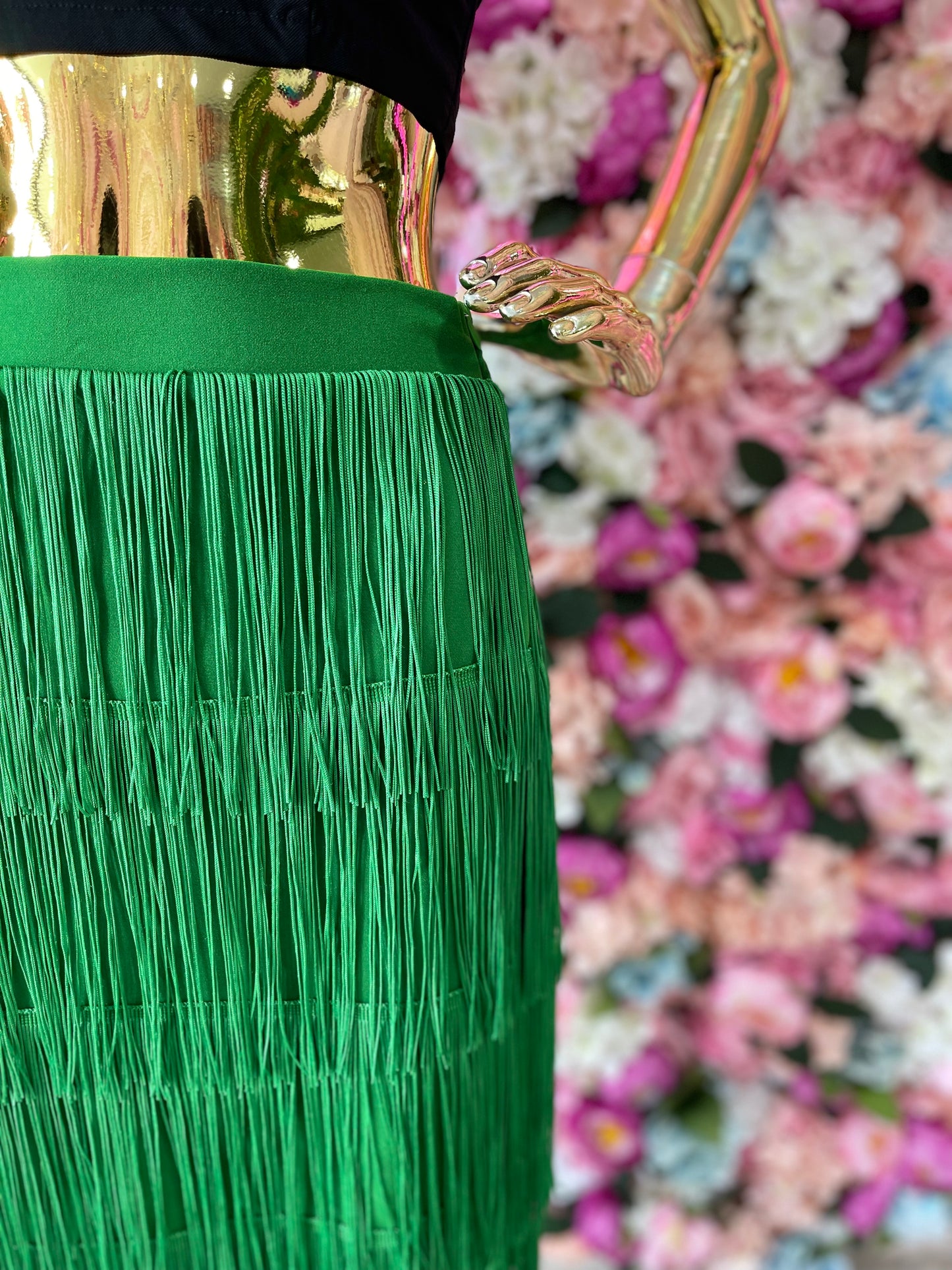 FALDA CON FLECOS VERDE